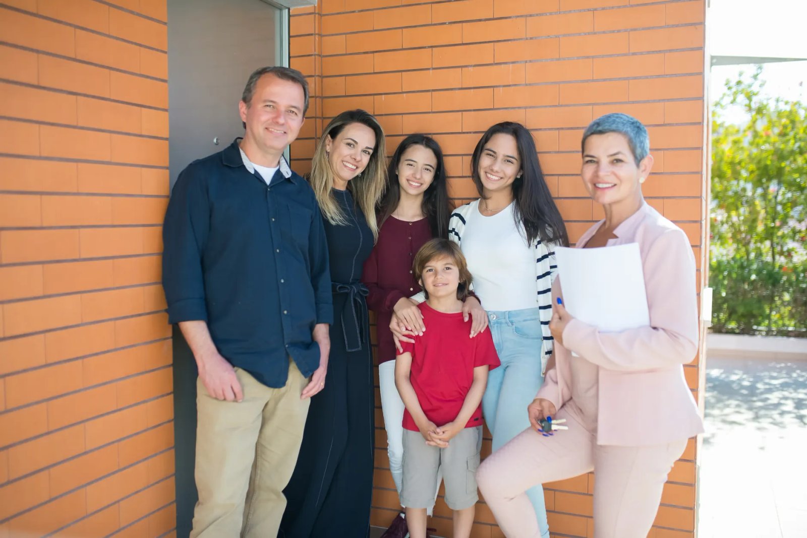 Happy family moving into new home